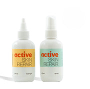 Two bottles of 'active skin repair' products on a white background